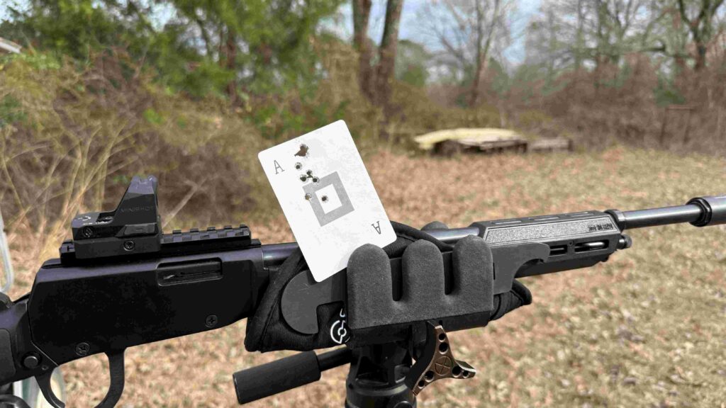 Photo of range results on a playing card. 