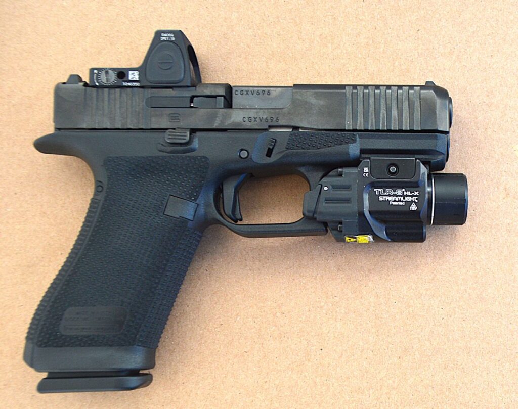 Photo of Glock pistol outfitted with a light 