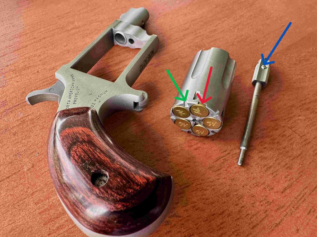 Photo of revolver cyclinder and a loaded chamber